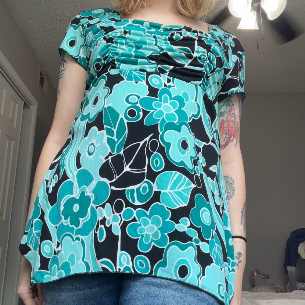 Y2K whimsical teal and black patterned fairy top